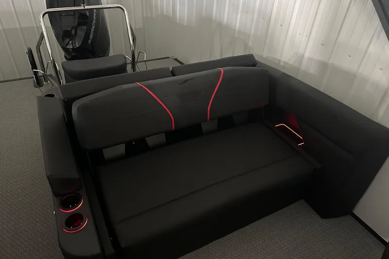 Slide: The Image of Luxurious Evotti 725CS 2026 boat seating with red LED lighting and sleek black upholstery. - 25