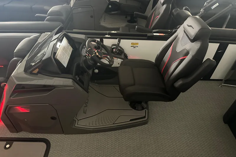 Slide: The Image of Evotti 725CS 2026 boat with Mercury engine in a metal-walled storage area. - 28