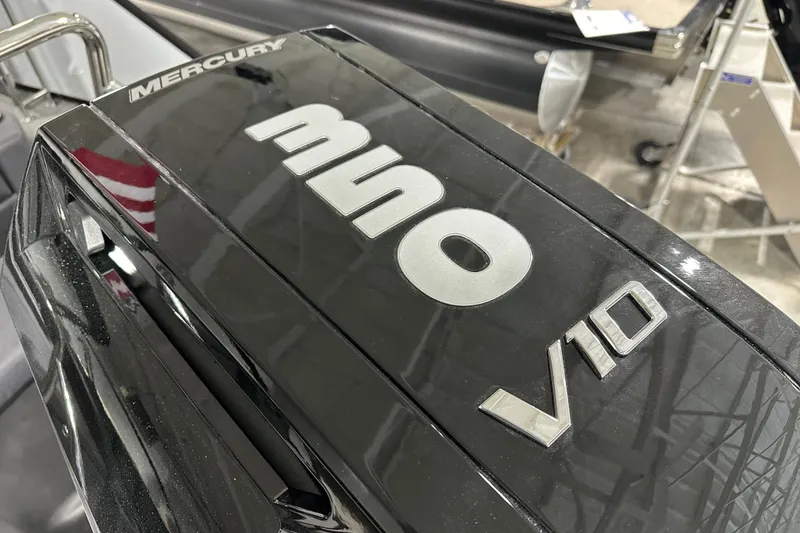 Slide: The Image of Mercury V10 engine on Evotti 725CS, 2026 model, in a showroom setting. - 3