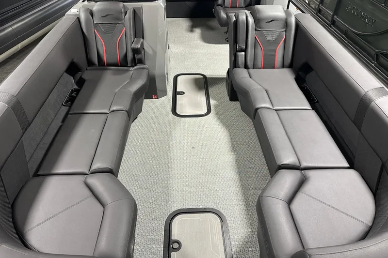 Slide: The Image of Interior of 2026 Evotti 725CS boat with sleek black seating and modern design. - 8