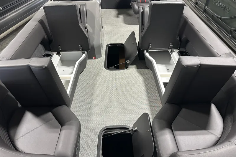 Slide: The Image of Interior of 2026 Evotti 725CS boat with open storage compartments and seating. - 9