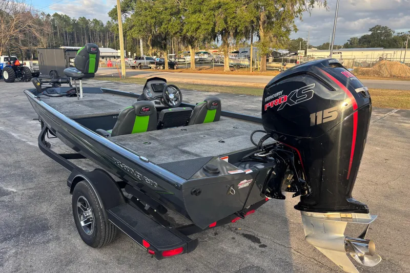 Slide: The Image of 2022 Ranger RT188 boat with Mercury Pro XS 115 engine, parked outdoors. - 10