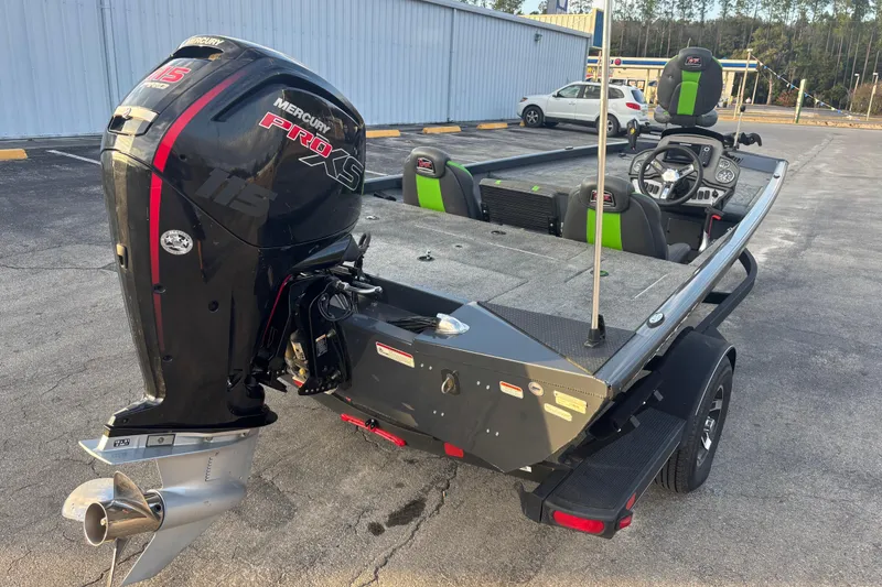 Slide: The Image of 2022 Ranger RT188 boat with Mercury Pro XS engine, parked outdoors. - 11