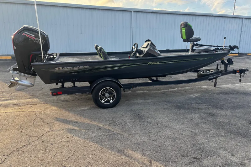 Slide: The Image of 2022 Ranger RT188 fishing boat on trailer, featuring Mercury engine. - 12