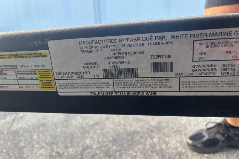 Slide: The Image of 2022 Ranger RT188 trailer label with specifications and load capacity details. - 17
