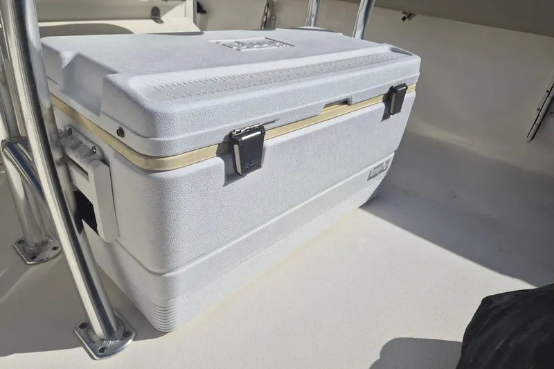 Slide: The Image of Cooler on 2021 Key West 239 FS boat deck, secured with metal brackets. - 8