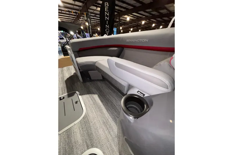 Slide: The Image of Interior of 2026 Bennington 23 M Open Fast Back boat with sleek seating and cup holder. - 5