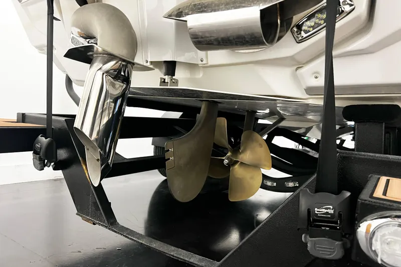 Slide: The Image of 2022 Nautique Super Air Nautique G23 boat propeller and exhaust detail. - 4