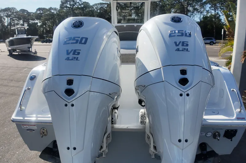 Slide: The Image of Twin Yamaha 250 V6 outboard engines on a 2025 Sea Hunt Ultra 275 SE boat. - 2