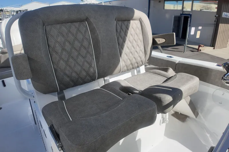 Slide: The Image of 2025 Sea Hunt Ultra 275 SE boat seats with diamond-patterned upholstery. - 15