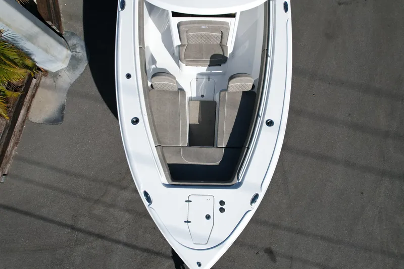 Slide: The Image of 2025 Sea Hunt Ultra 275 SE boat, aerial view of bow seating area. - 6