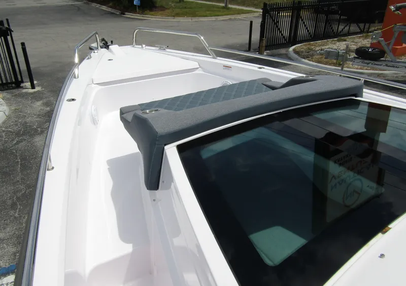 Slide: The Image of 2024 Axopar 37 Sun Top boat deck with sleek design and modern features. - 8