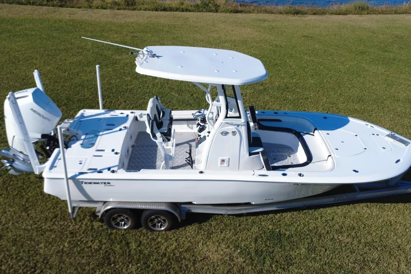 Slide: The Image of 2024 Tidewater 2500 Carolina Bay boat on grass, aerial view. - 15