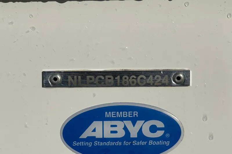 Slide: The Image of 2024 Tidewater 2500 Carolina Bay boat with ABYC member plaque and serial number. - 56