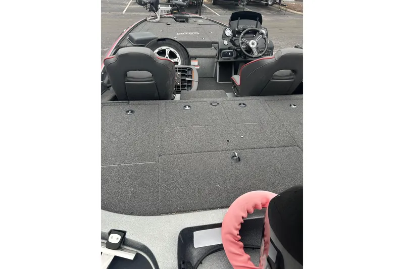 Slide: The Image of 2018 Nitro Z19 Pro boat interior with steering wheel and seating. - 1