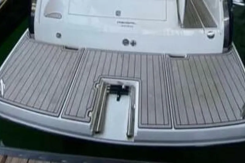 Slide: The Image of 2006 Regal 3060 Window Express boat with spacious swim platform. - 4