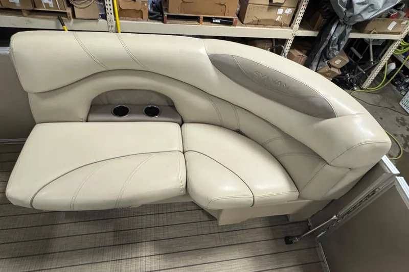 Slide: The Image of 2018 Sylvan Mirage Fish 8522 Party Fish boat seating with cup holders in a workshop. - 6
