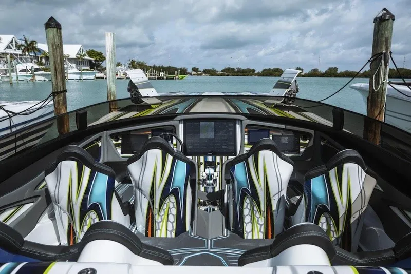 Slide: The Image of Interior of a 2022 MTI 48 boat with modern design and vibrant seating. - 6