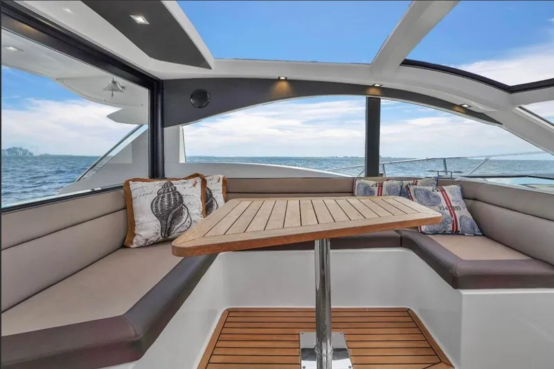 Slide: The Image of Luxurious interior of 2017 Galeon 445 HTS yacht with ocean view and elegant seating. - 19