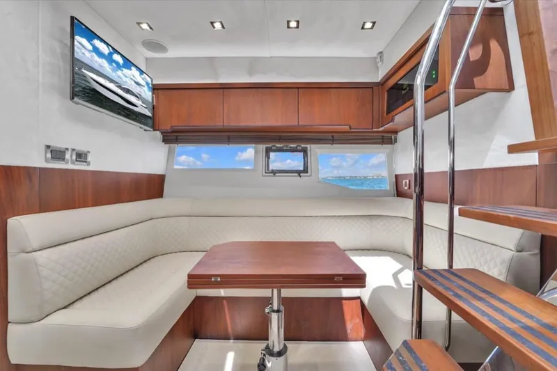 Slide: The Image of Luxurious interior of 2017 Galeon 445 HTS yacht with elegant seating and wooden accents. - 20
