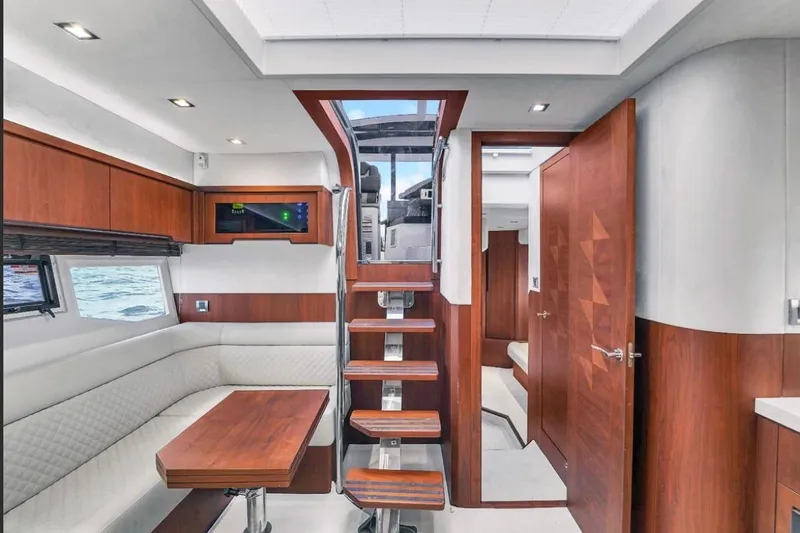 Slide: The Image of Luxurious interior of 2017 Galeon 445 HTS yacht with elegant wood finishes and modern design. - 23