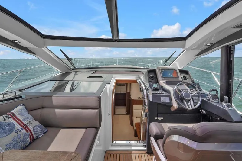 Slide: The Image of Interior view of 2017 Galeon 445 HTS yacht with modern helm and seating. - 24