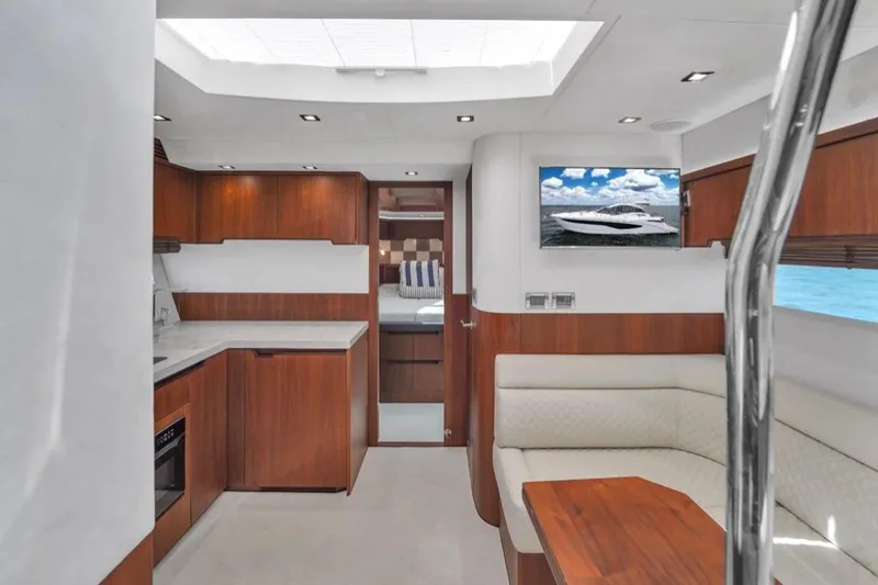 Slide: The Image of Luxurious interior of 2017 Galeon 445 HTS yacht with modern kitchen and seating area. - 26