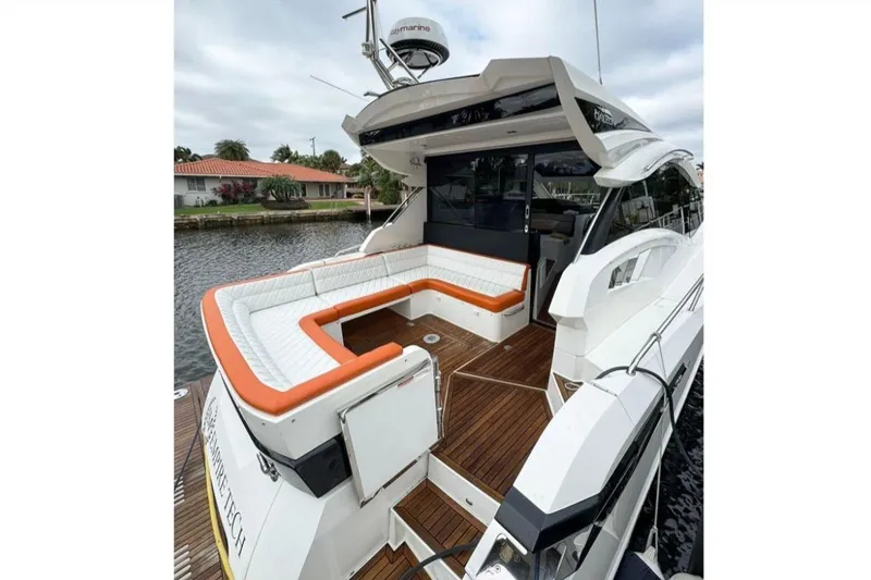 Slide: The Image of 2017 Galeon 445 HTS yacht with spacious deck and luxurious seating. - 29