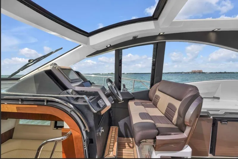 Slide: The Image of Interior of 2017 Galeon 445 HTS yacht with modern helm and seating. - 5