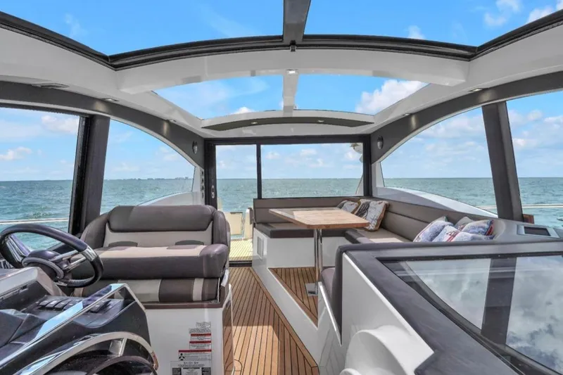 Slide: The Image of Interior of 2017 Galeon 445 HTS yacht with ocean view and modern seating. - 8