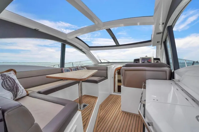 Slide: The Image of Luxurious interior of 2017 Galeon 445 HTS yacht with panoramic windows and elegant seating. - 9