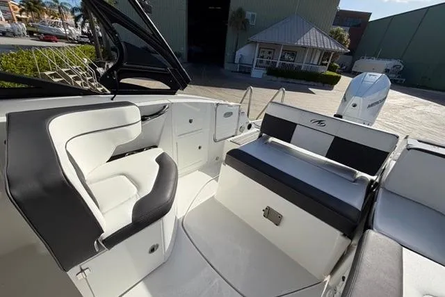 Slide: The Image of 2021 Monterey M-65 boat interior with sleek seating and modern design. - 14