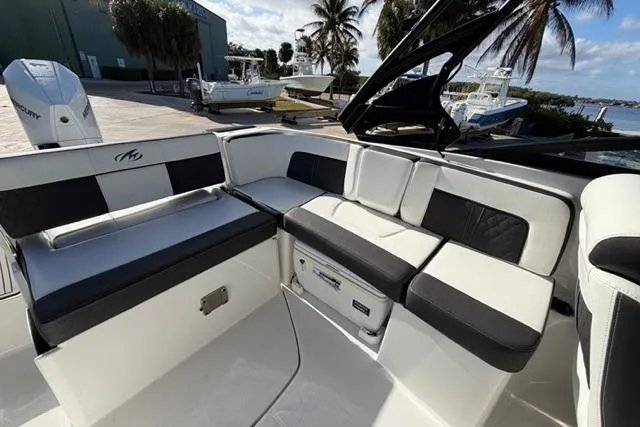 Slide: The Image of Luxurious seating on 2021 Monterey M-65 boat, featuring sleek design and comfortable upholstery. - 15