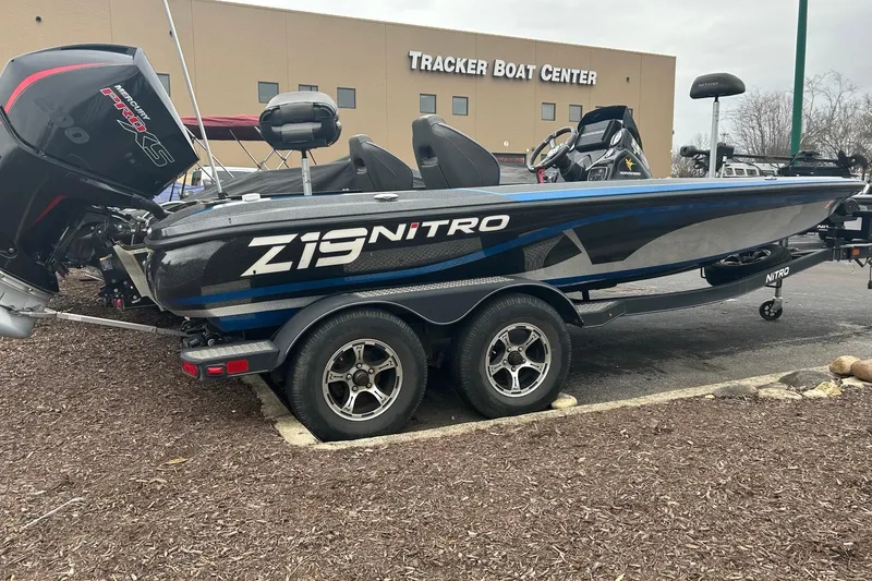The Image of 2019 Nitro Z19 boat parked at Tracker Boat Center, featuring sleek design and powerful engine. - 0