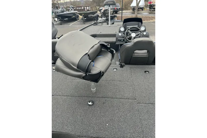 Slide: The Image of 2019 Nitro Z19 boat interior with swivel seat and steering console. - 4