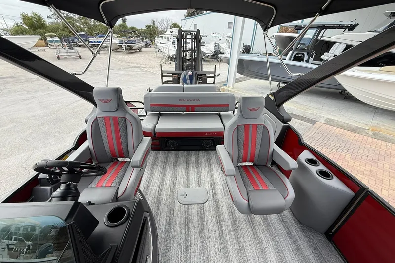 Slide: The Image of 2026 Bennington 26 M Center Swingback boat interior with stylish seating and modern design. - 15