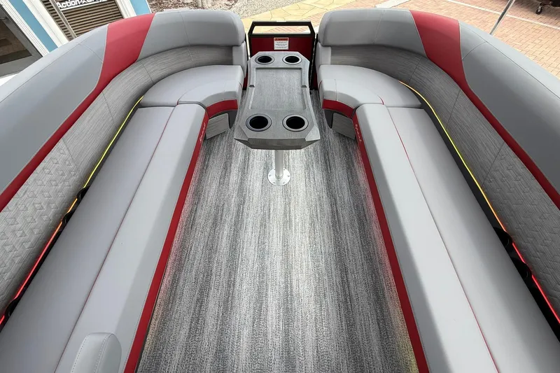 Slide: The Image of Luxurious interior of 2026 Bennington 26 M Center Swingback pontoon boat with stylish seating. - 19