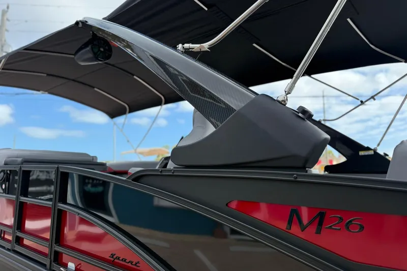 Slide: The Image of 2026 Bennington 26 M Center Swingback boat with sleek design and canopy. - 3