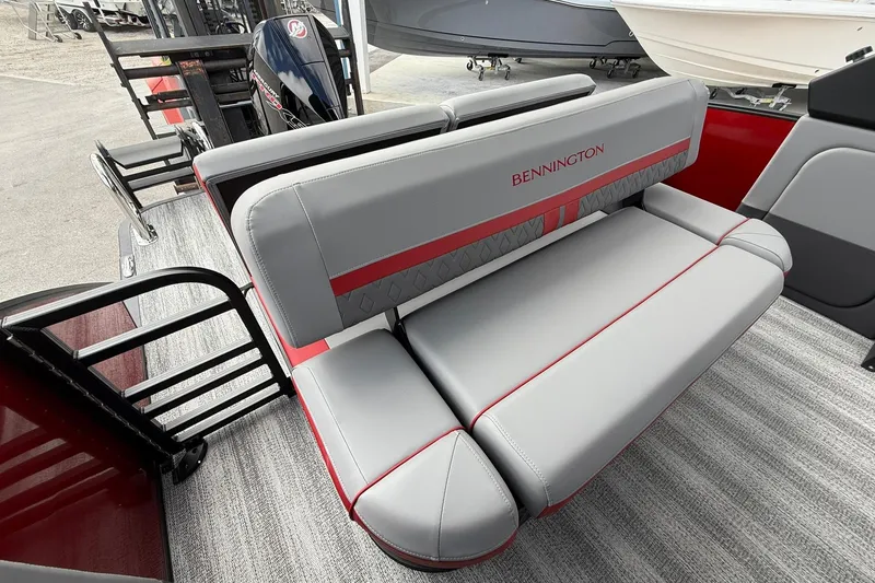 Slide: The Image of 2026 Bennington 26 M Center Swingback boat interior with stylish seating and modern design. - 9