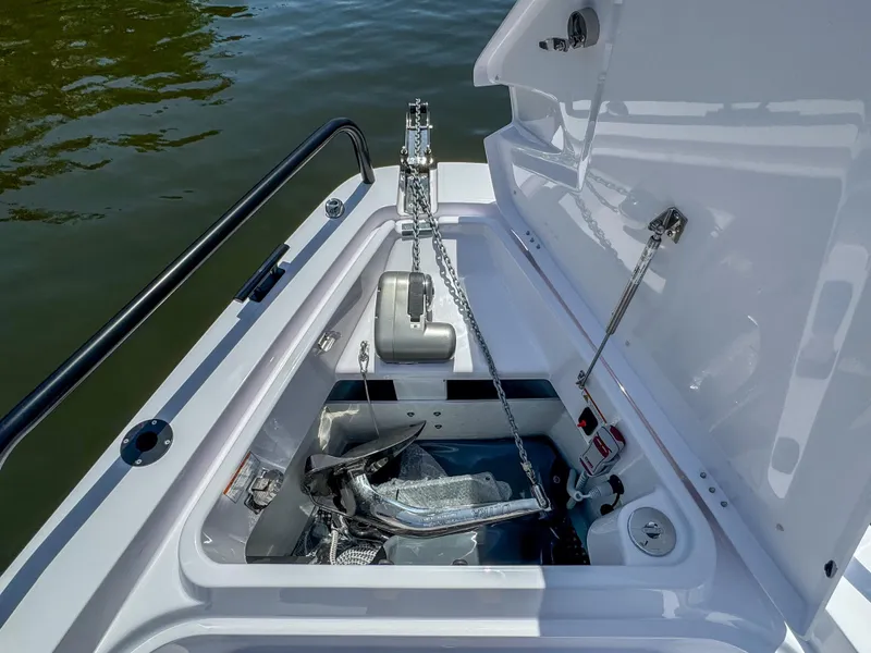 Slide: The Image of Anchor compartment of 2025 Axopar 37 Sun Top BRABUS Trim boat. - 38