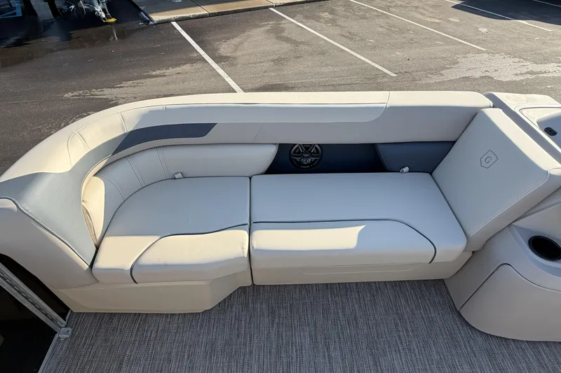 Slide: The Image of 2026 Godfrey Sweetwater 2086 C boat interior with plush seating and modern design. - 9