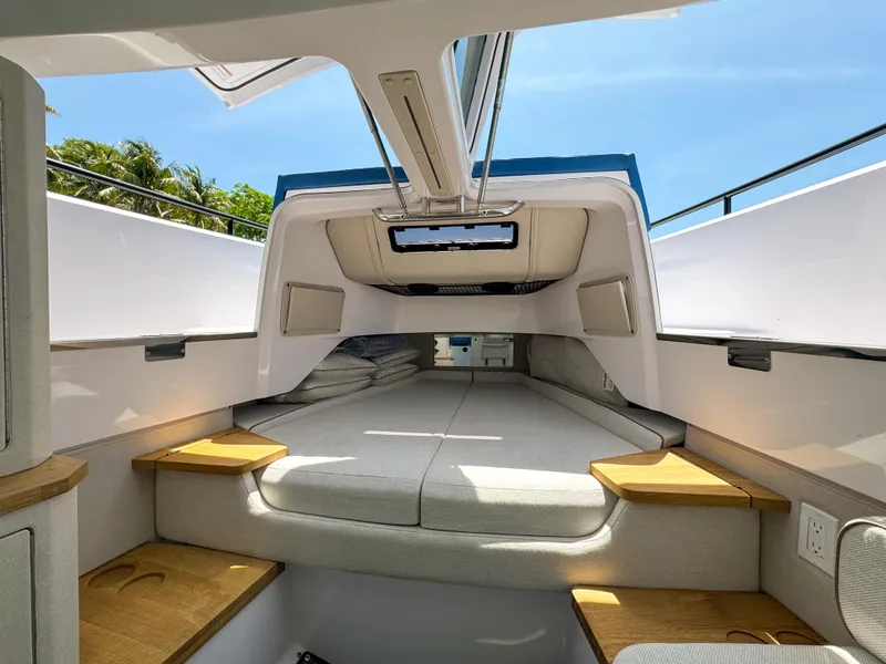 Slide: The Image of Luxurious interior cabin of 2025 Axopar 37 Sun Top BRABUS Trim boat. - 22