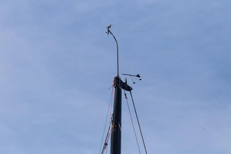 Slide: The Image of Mast top of 2008 J Boats J/122 sailboat against clear blue sky. - 21