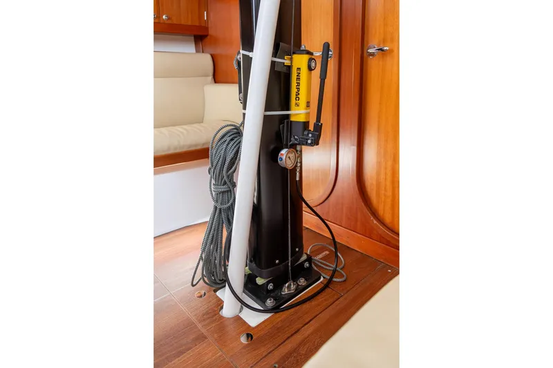 Slide: The Image of Interior of 2008 J Boats J/122 sailboat with wood finish and cozy seating area. - 24