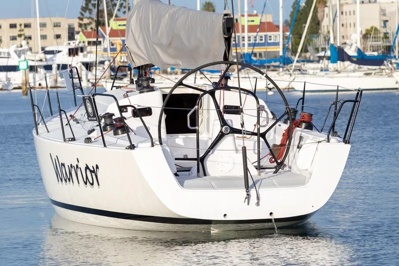 Slide: The Image of 2008 J Boats J/122 sailboat named Warrior docked in a marina. - 4