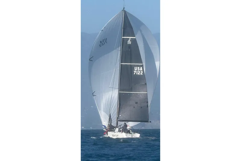 Slide: The Image of Sail of 2008 J Boats J/122 with USA 7122 marking against blue sky. - 58
