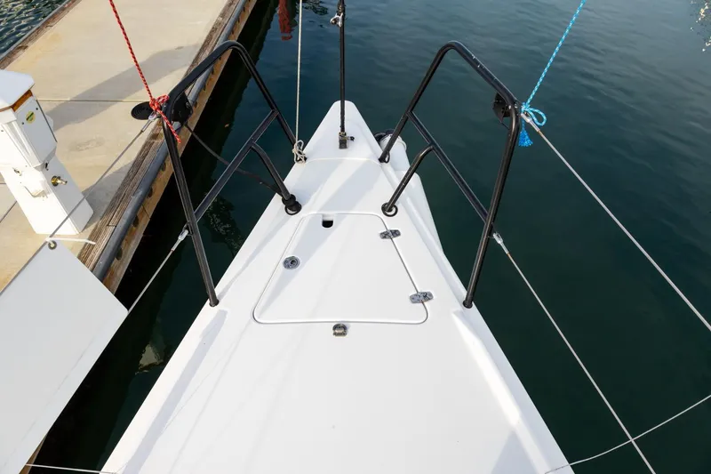 Slide: The Image of Bow of 2008 J Boats J/122 sailboat docked at marina. - 7