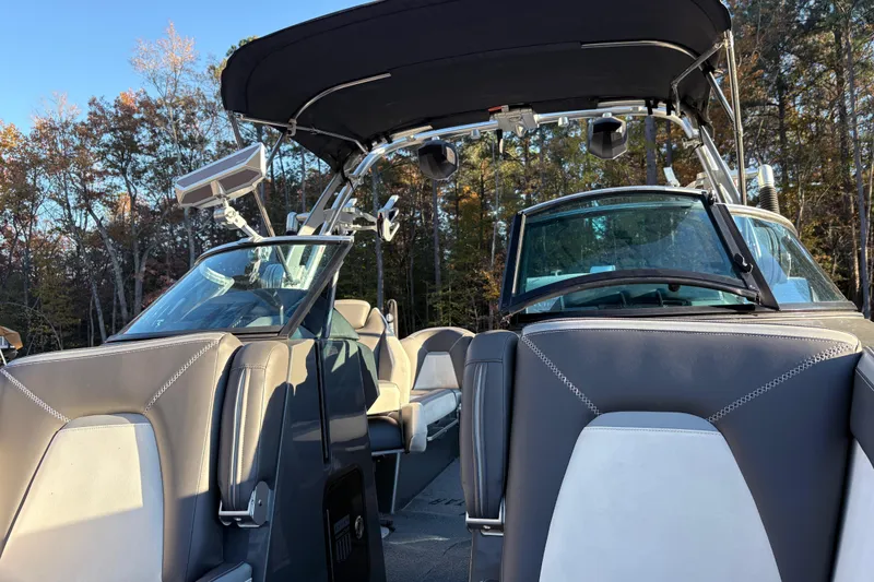 Slide: The Image of 2019 MasterCraft XStar boat interior with sleek seating and modern design. - 10