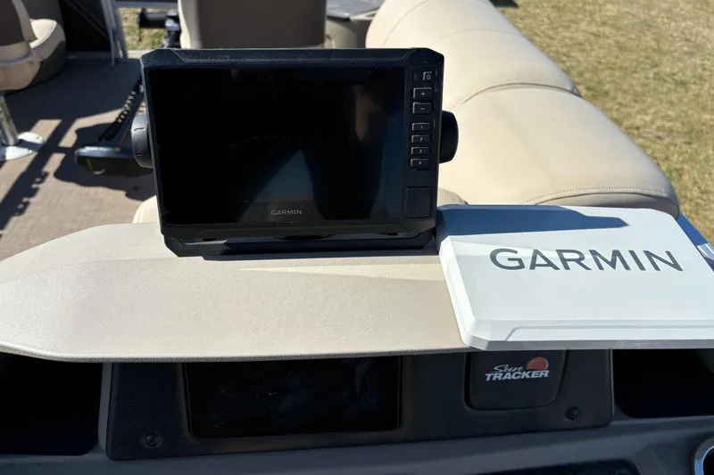 Slide: The Image of 2024 Sun Tracker Fishin' Barge 20 DLX with Garmin navigation system on dashboard. - 59