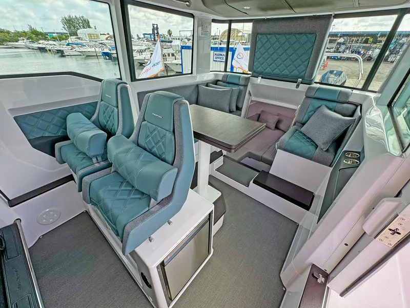 Slide: The Image of Luxurious interior of 2024 Axopar 37XC CROSS CABIN with plush seating and modern design. - 14